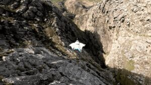 jump off a mountain wearing wingsuits