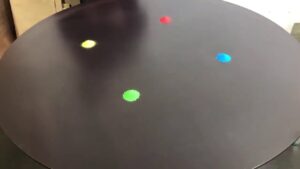 “plays” a steel table like an instrument